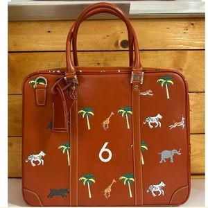 Very troubled child briefcase Darjeeling safari bag